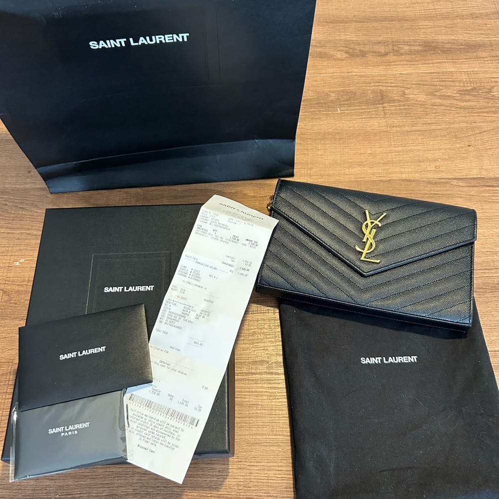 YSL purse. Please see pics for detailed views of wear